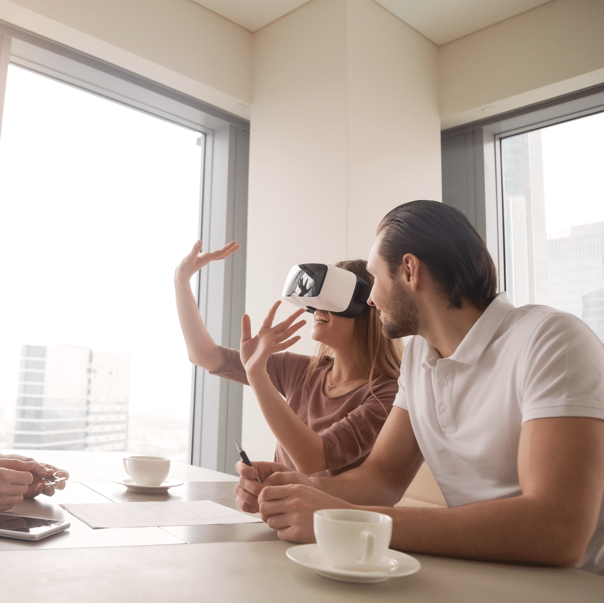 Couple using VR headset to walk through future home
